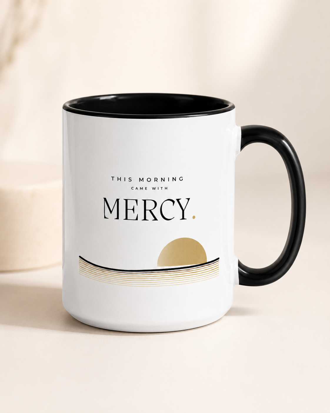 This Morning Came With Mercy Christian mug with black handle and muted gold sunrise design