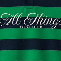 Close-up of ivory ALL THINGS calligraphy with small TOGETHER lettering on green and navy stripes