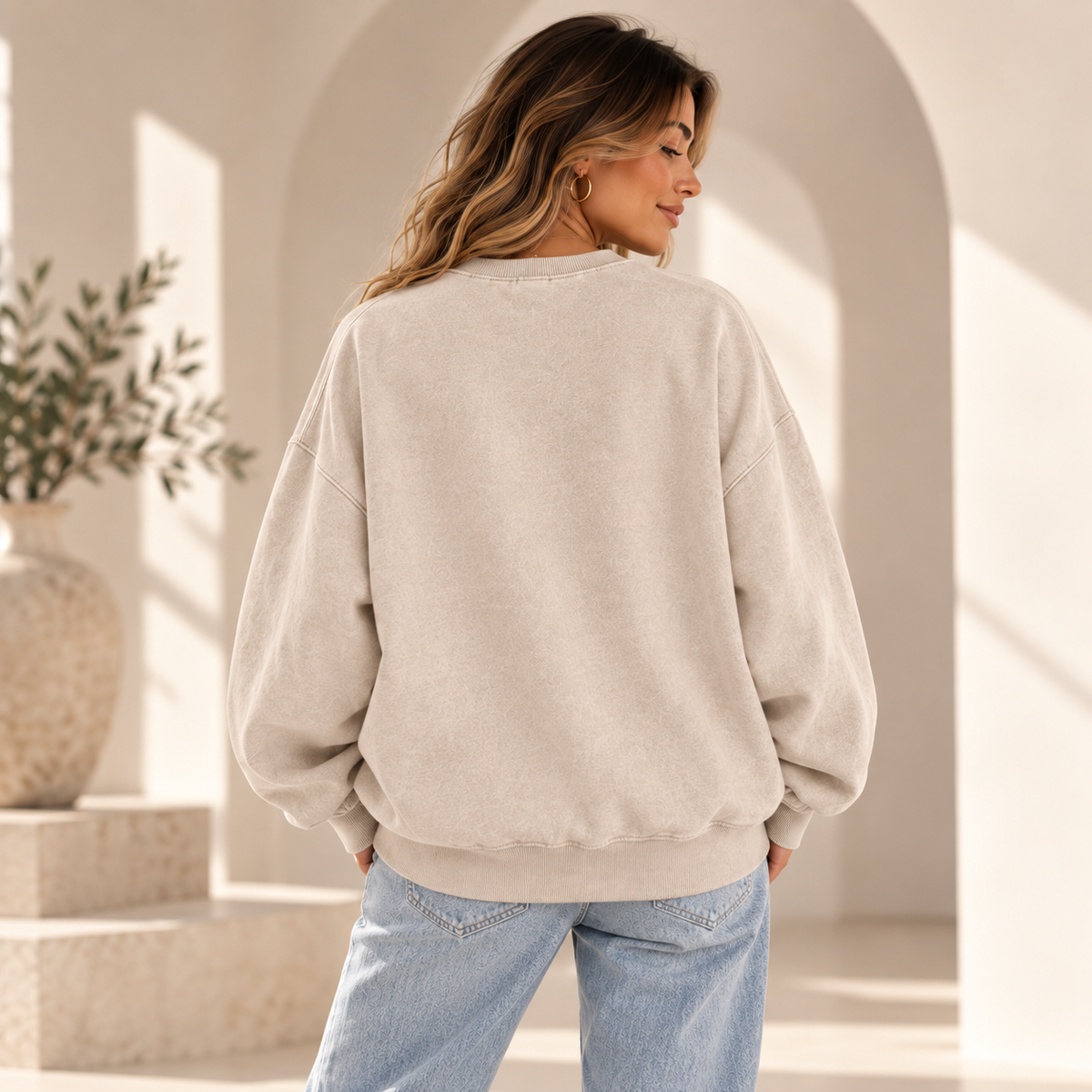 Back view of the Light Apricot Snow Washed Oversized Sweatshirt showing the relaxed drop-shoulder silhouette