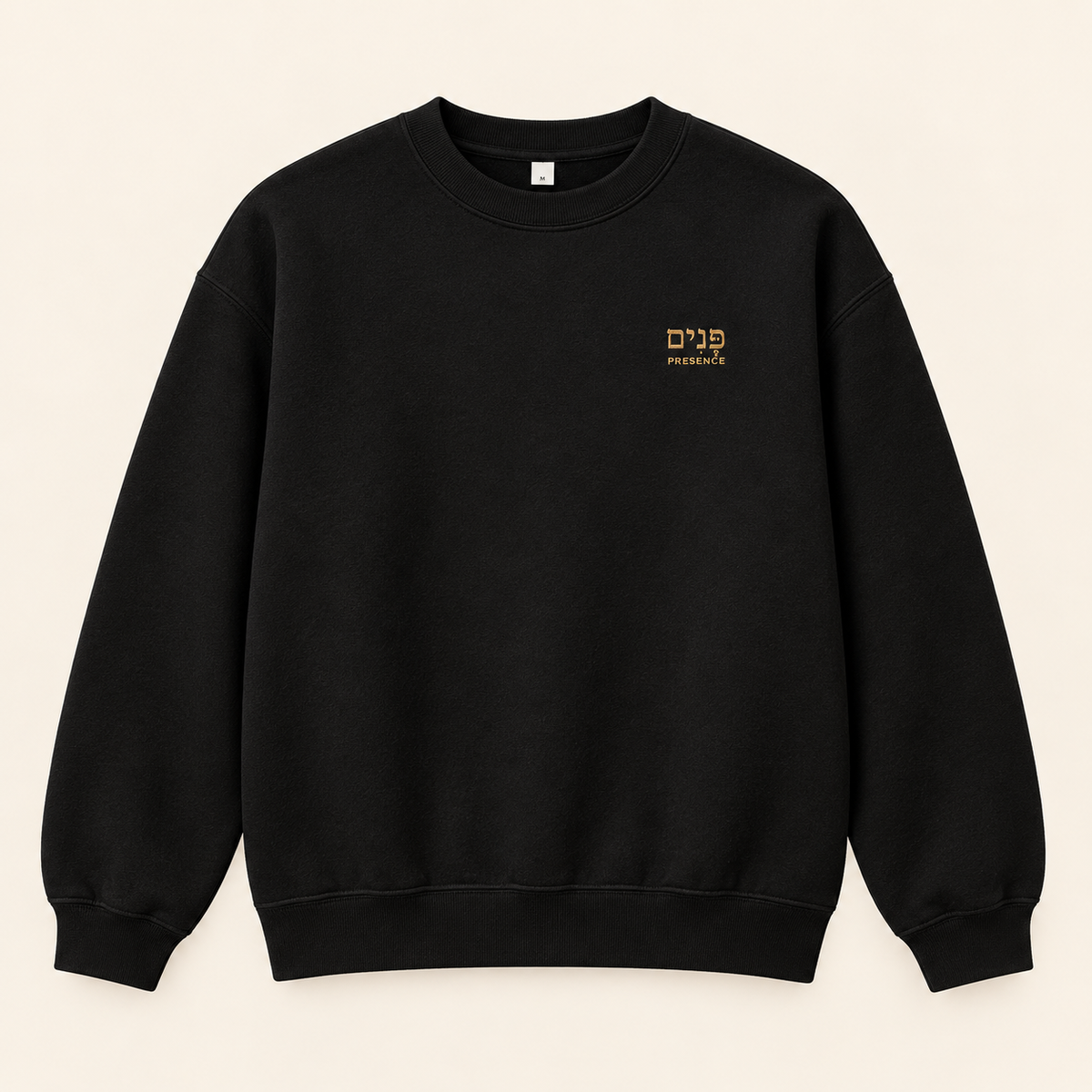 A black crewneck sweatshirt shown from the front with small gold Hebrew embroidery and the word “Presence” on the left chest, displayed flat against a light beige background.