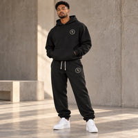 BELIEVER IDENTITY | Essential Sweatpants — Warm Ivory BI Emblem