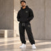 BELIEVER IDENTITY | Essential Sweatpants — Warm Ivory BI Emblem