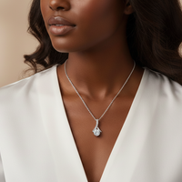 Hephzibah ribbon pendant necklace on model in white blouse, angled – Christian gift jewelry