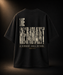 Back of THE REMNANT black oversized heavyweight T-shirt with distressed Isaiah 10:21 artwork